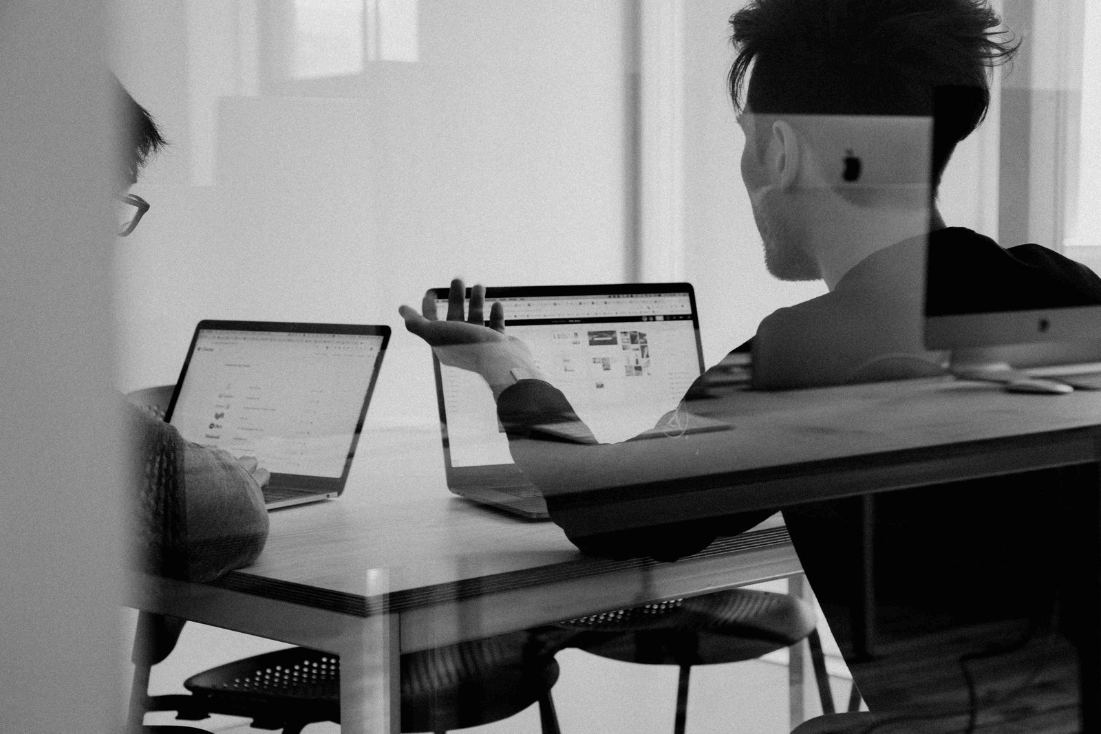 Modern office with creative team working on computers
